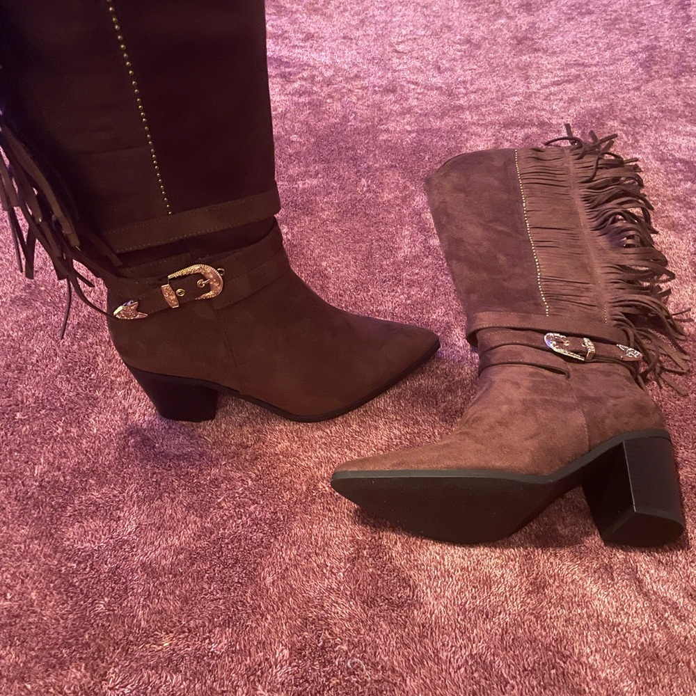 Women’s brown faux suede tassel boots.
